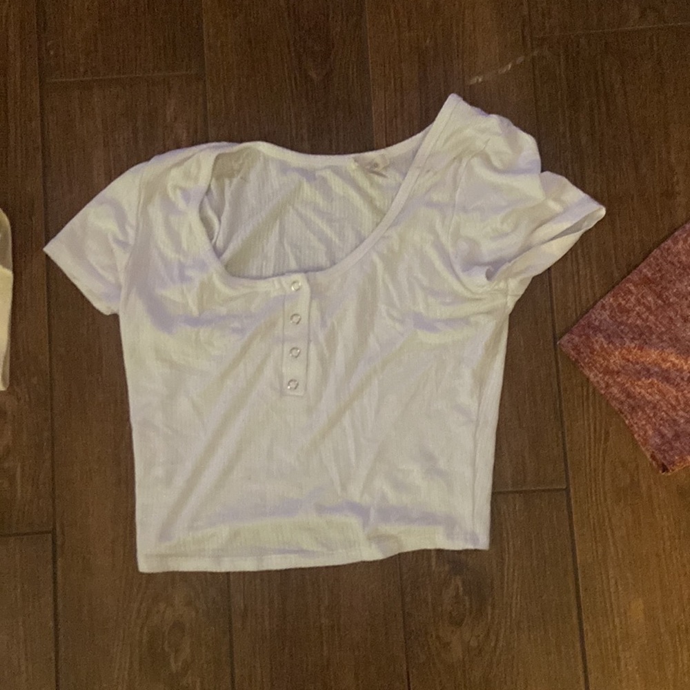 white, tight, half button-up crop tee